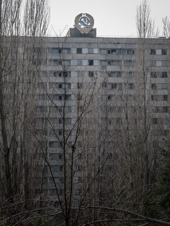 Visiting the Chernobyl Exclusion Zone; abandoned building in Pripyat, Ukraine