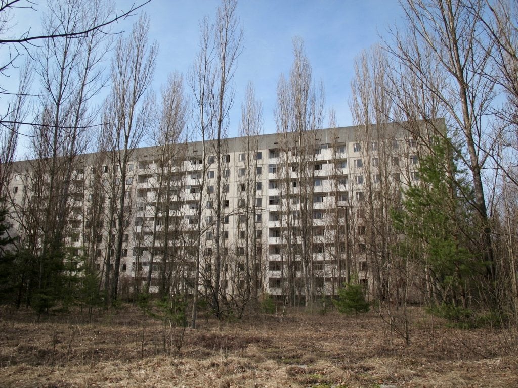 Visiting the Chernobyl Exclusion Zone; abandoned building in Pripyat, Ukraine