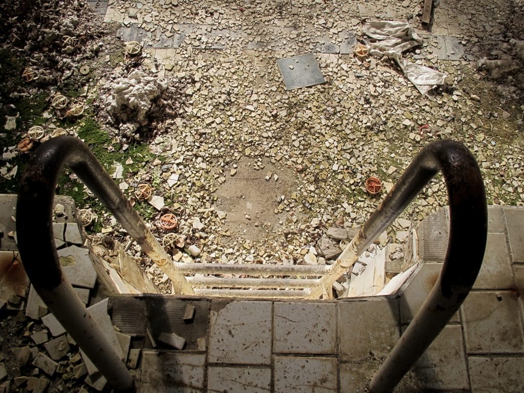Visiting the Chernobyl Exclusion Zone; swimming pool in Pripyat, Ukraine