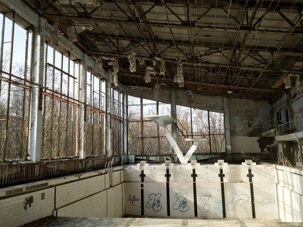 Visiting the Chernobyl Exclusion Zone; swimming pool in Pripyat, Ukraine