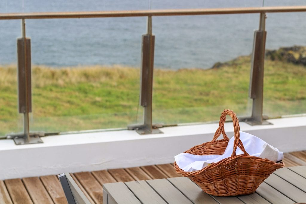 Santa Barbara Lodge by Santa Barbara Eco-Beach Resort in Sao Miguel, Azores breakfast basket with an oceanview