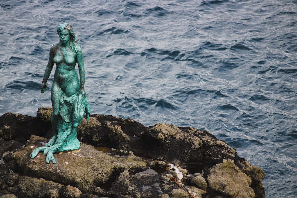 selkie seal woman statue in mikladalur on kalsoy in the faroe islands