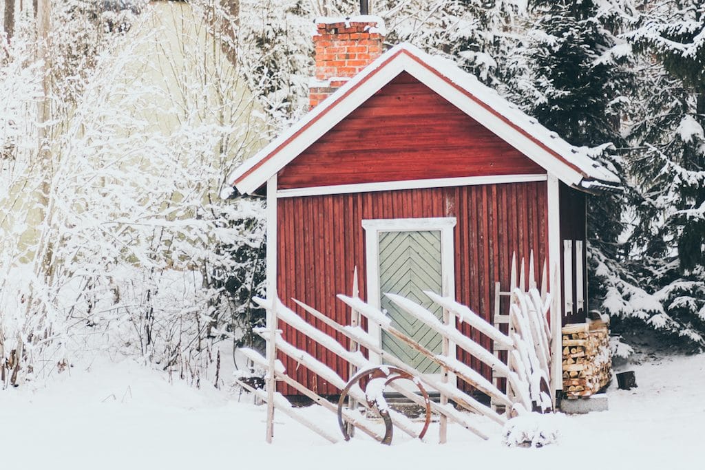 Nuuksio National Park: The Most Beautiful Winter Day Trip From Helsinki red house in forest