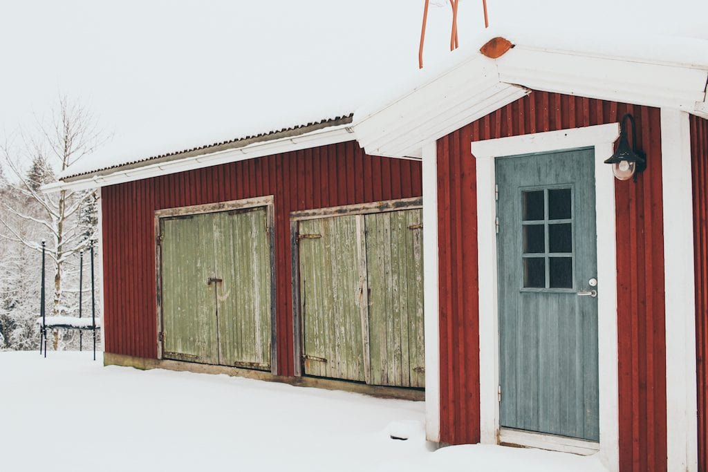 Nuuksio National Park: The Most Beautiful Winter Day Trip From Helsinki red house in forest