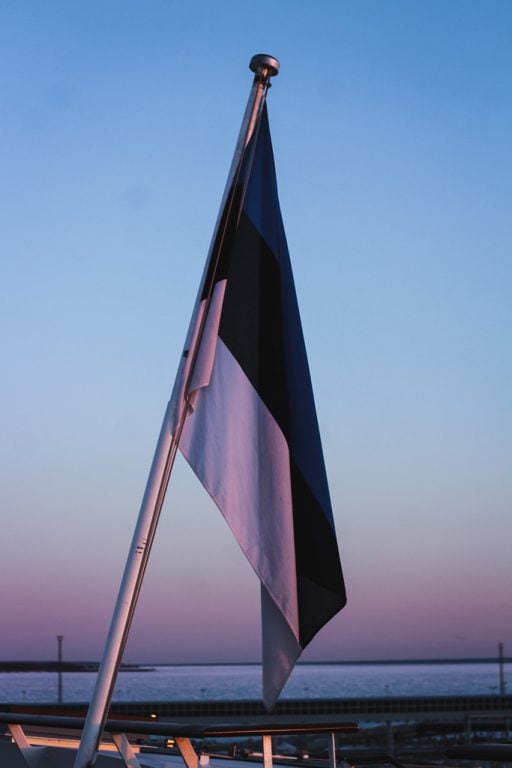 Tallinn to Helsinki Ferry: Cruising Across the Baltic Sea with Tallink Megastar estonia flag at sunrise
