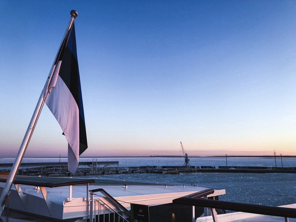 Tallinn to Helsinki Ferry: Cruising Across the Baltic Sea with Tallink Megastar estonia flag outside of ship