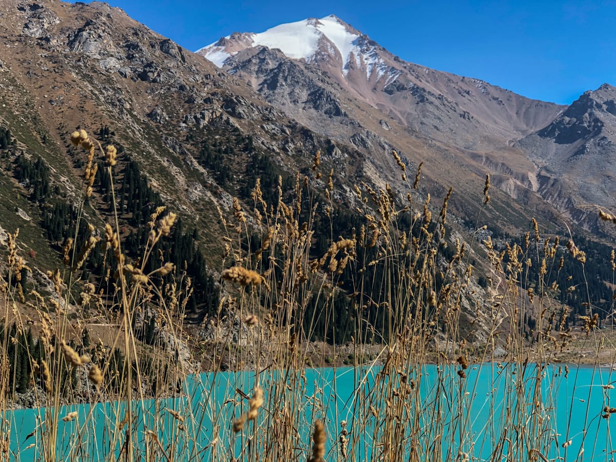 big almaty lake with big almaty peak in the background