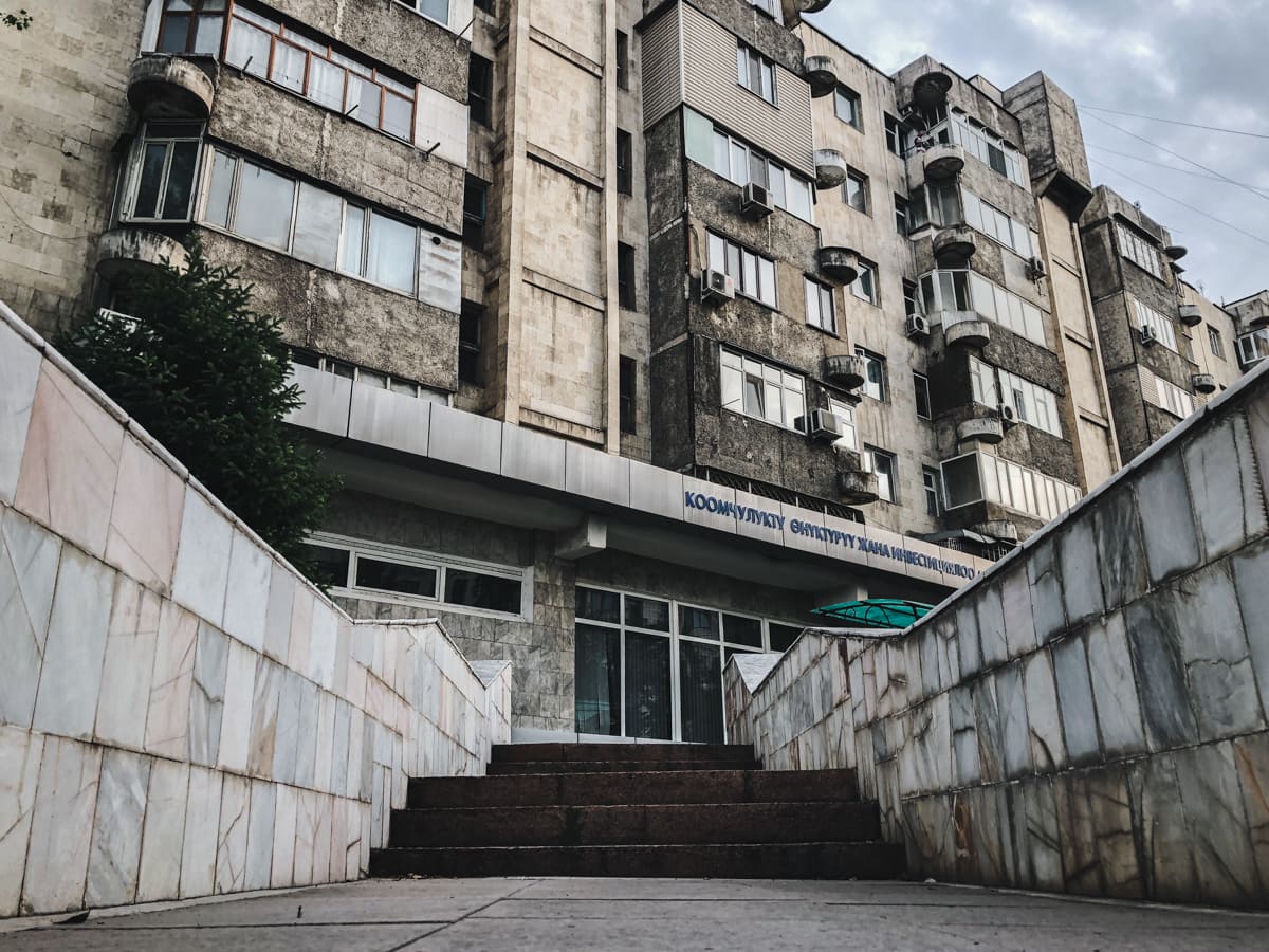 Central Asia Travel Tips: 50 Things to Know and Do Before You Visit soviet building in bishkek, kyrgyzstan