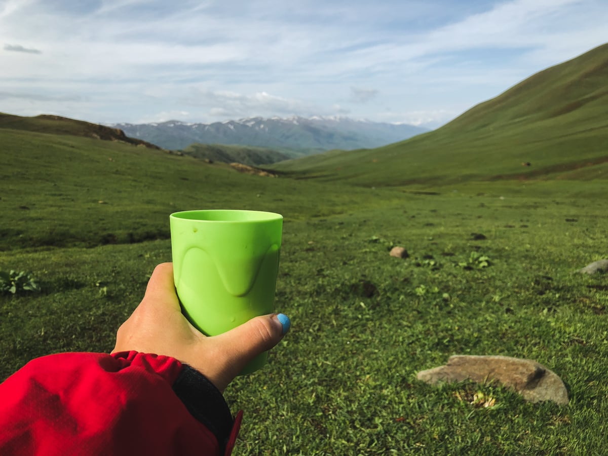 Central Asia Travel Tips: 50 Things to Know and Do Before You Visit coffee with a view in kyrgyzstan
