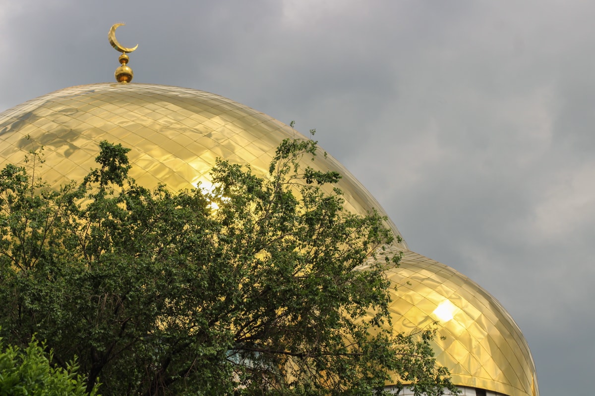 Central Asia Travel Tips: 50 Things to Know and Do Before You Visit mosque in almaty, kazakhstan near green bazaar