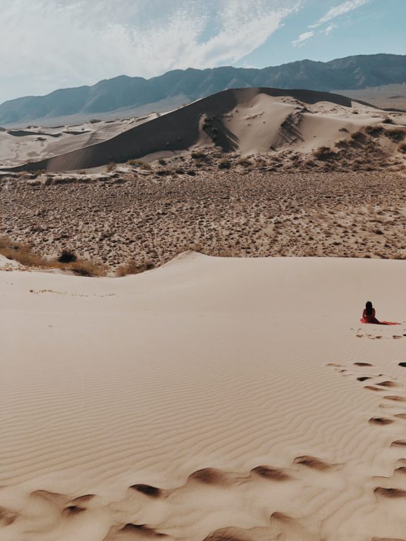 Singing Dunes Altyn Emel National Park Kazakhstan instagram photo shoot red dress
