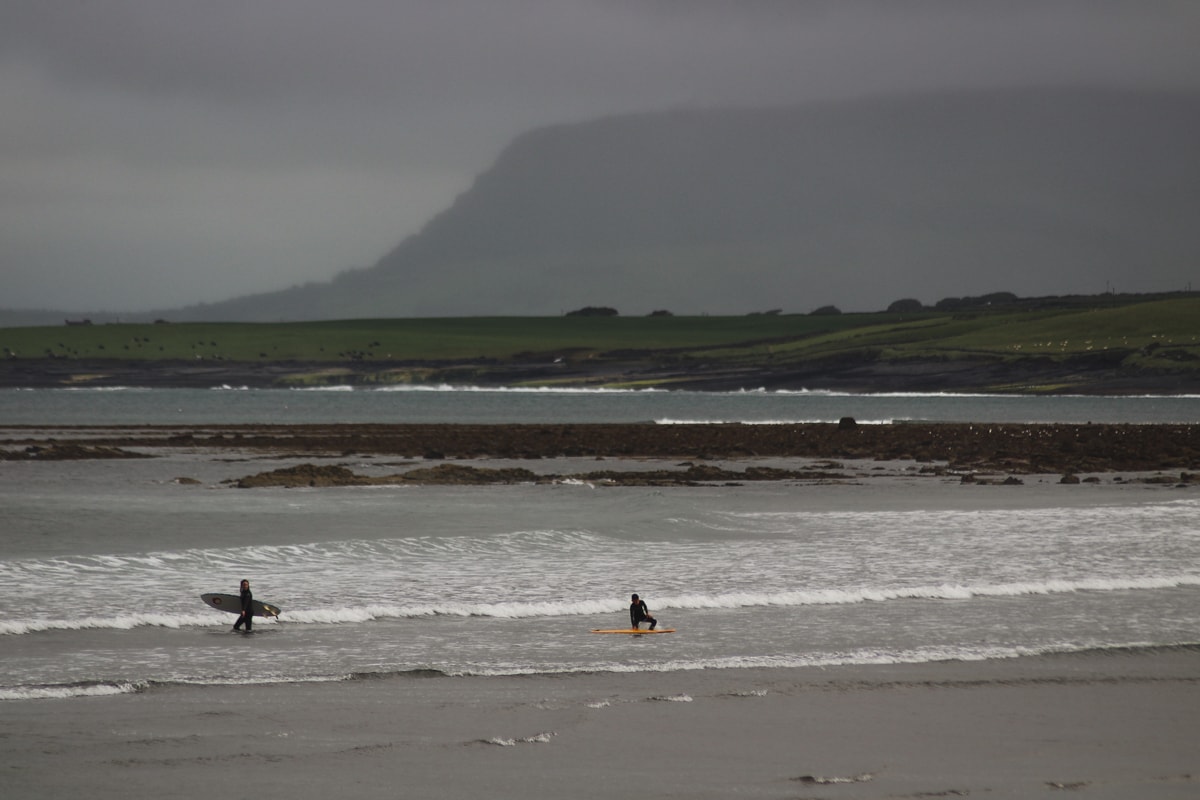 surfing at aughris in sligo ireland