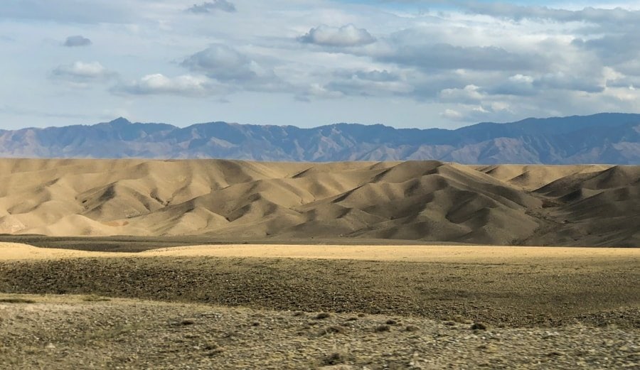 canyons and desert in kazakhstan on the way to kaindy lake