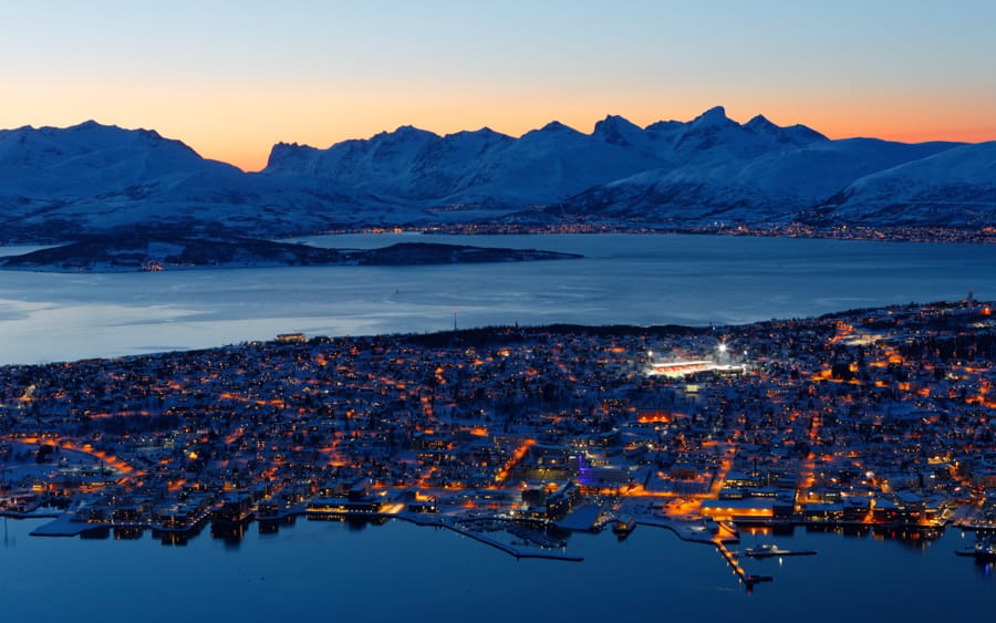 Tromsø in winter guide of things to do, places to visit, and what to do. Includes Tromsø tours and excursions, restaurants, and more!