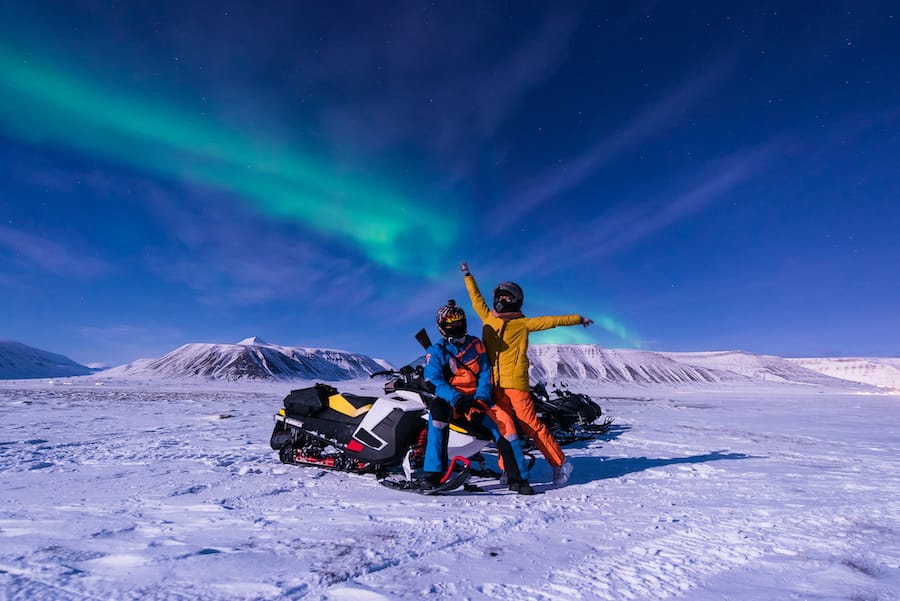 Svalbard snowmobile tours travel guide under the northern lights