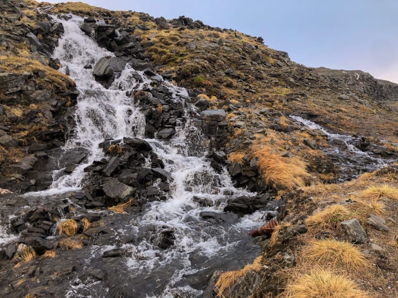 waterfall at north cape norway (magerøya) near gjesvær