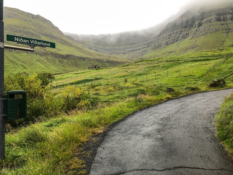 An island in the north of the Faroe Islands that often is forgotten about is Kunoy island. This is a Kunoy travel guide, including the forest on Kunoy and more.