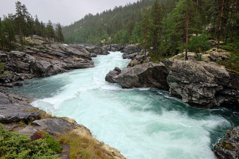 The Sjoa river provides the outlet from lake Gjende at Gjendesheim in the Jotunheimen mountains of Norway's Jotunheim National Park. It flows eastward into the Gudbrandsdalslågen river.