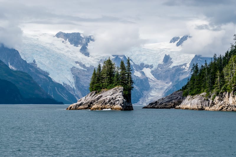 Island in Northwestern Fjord with glacier in the background taken from an Alaskan cruise ship
