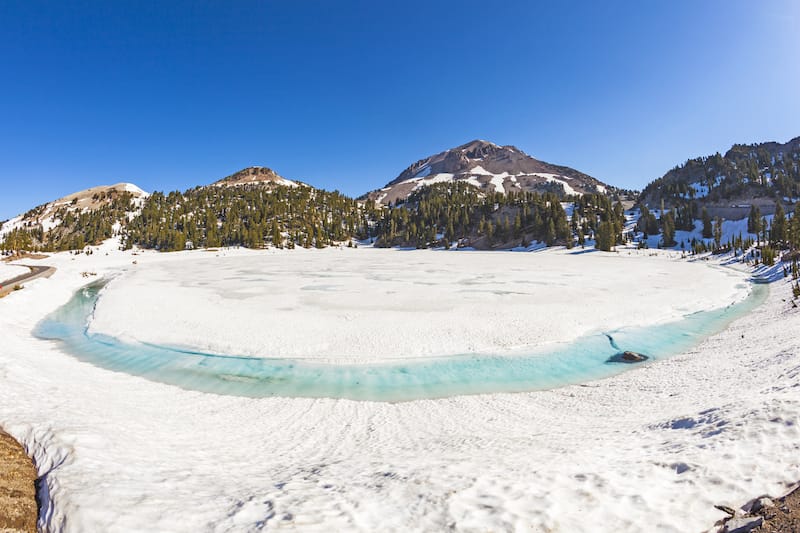 icy glacier lake on foot of Mount Lassen in the national park