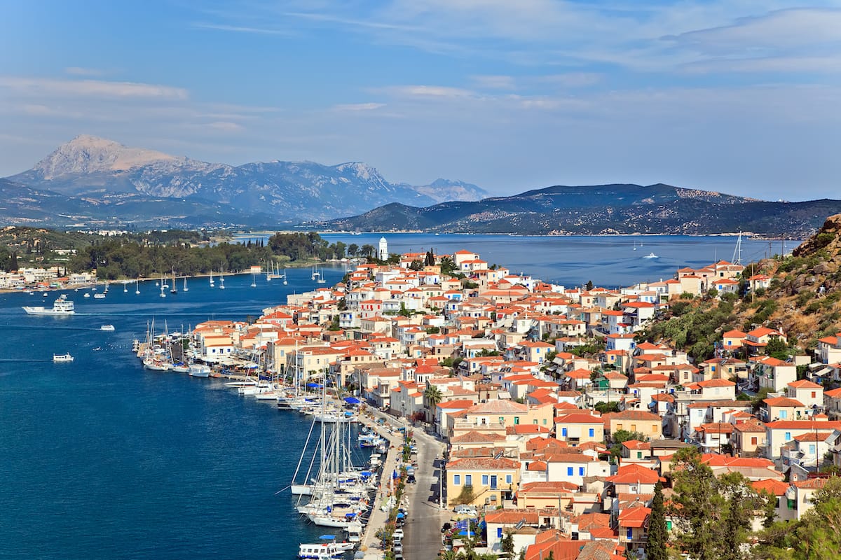 The art gallery in Poros sits inside an 18th-century example of island architecture on the backside promenade of the island. Best things to do in Poros, Greece