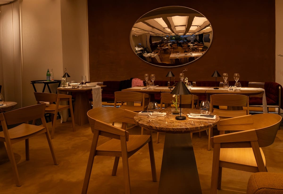 a fancy warm-toned dining room at a restaurant
best restaurants in almaty, kazakhstan