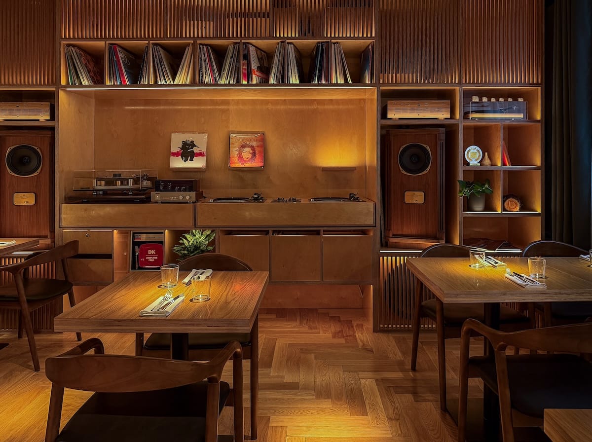 a restaurant room with DJ equipment and a soundsystem
best restaurants in almaty, kazakhstan