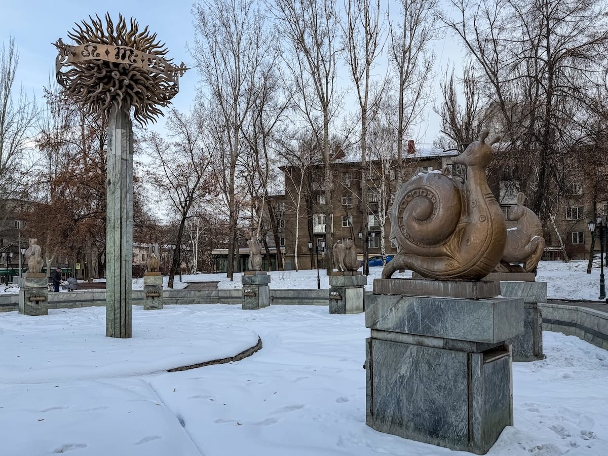 a fountain in the snow in almaty
