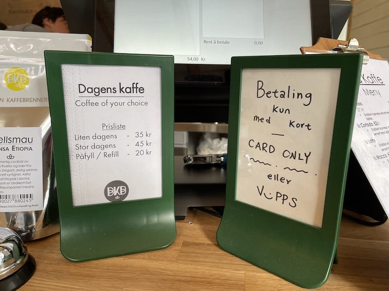 visit tromso tours A 'card only' sign at a coffee shop in Bergen