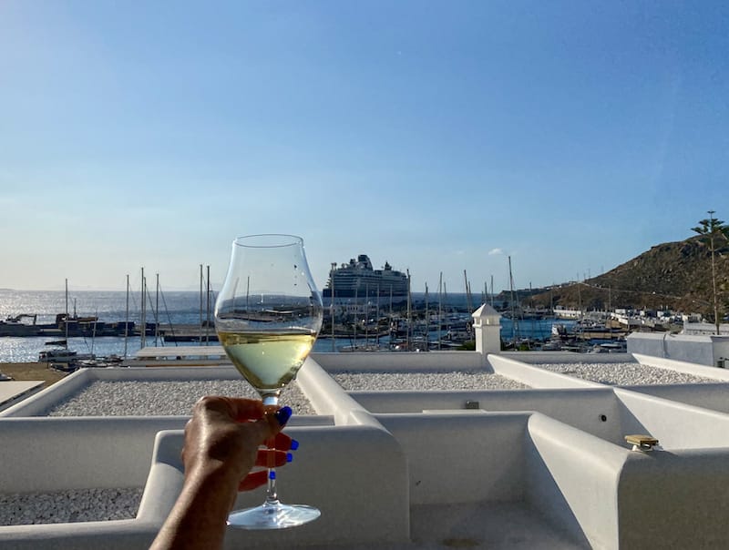 My sister enjoying wine by the pool