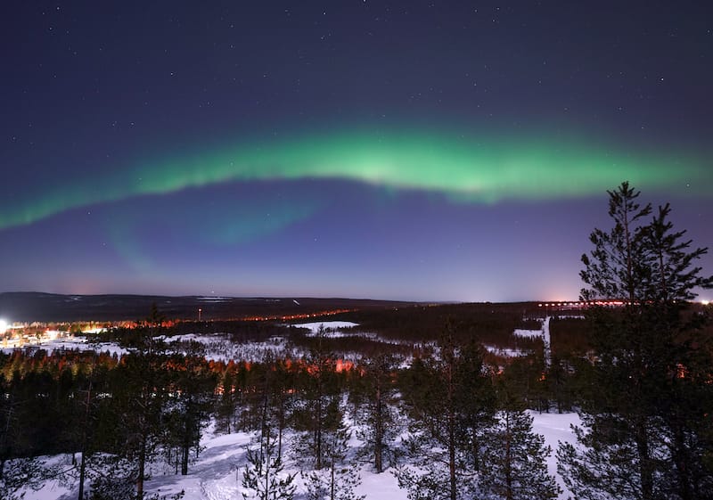 Northern lights beside the Arctic TreeHouse Hotel