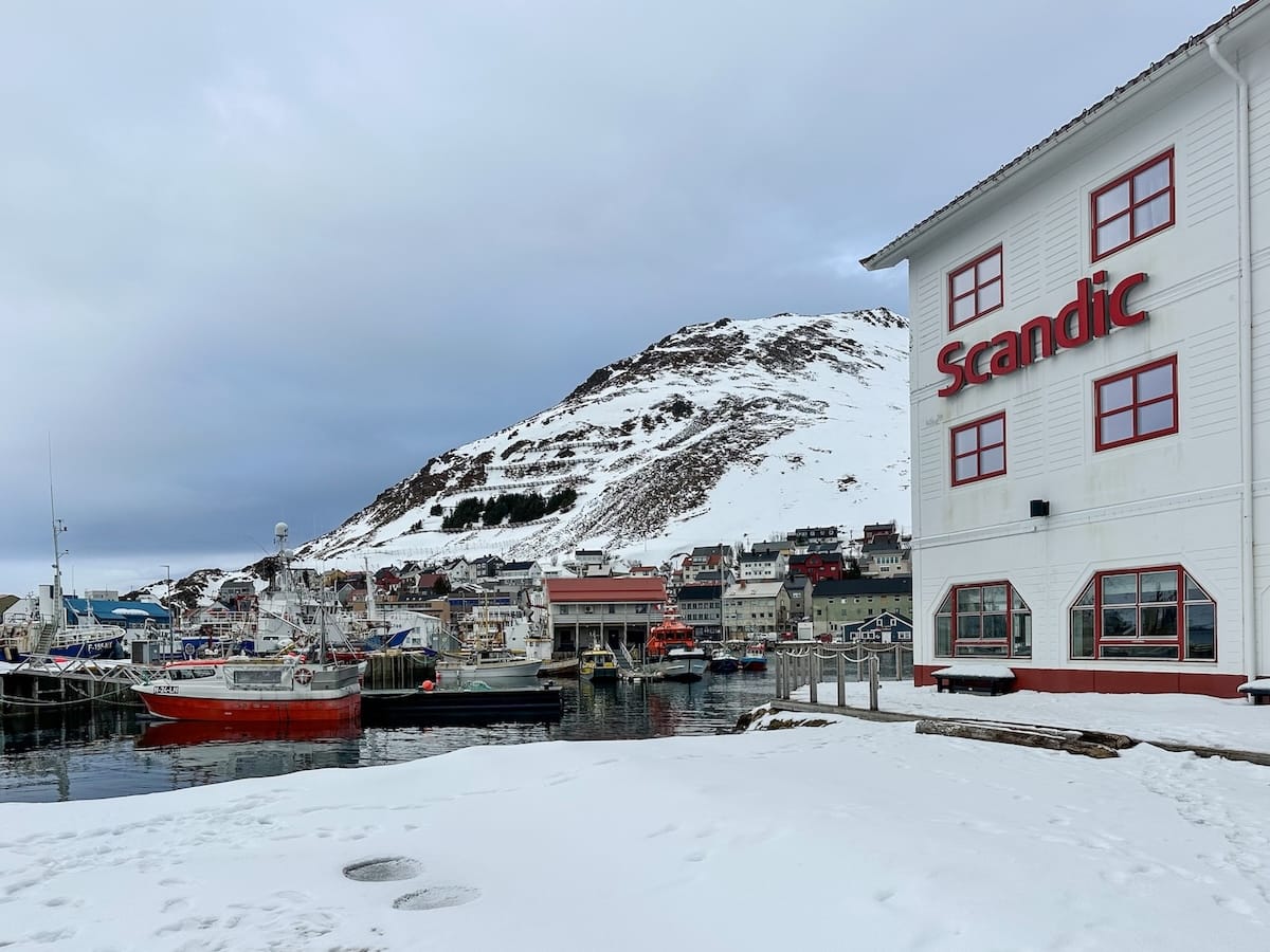 Scandic Bryggen is a great hotel in Honningsvåg, Norway and this photo shows its views as it sits along the harbor. Snow is on the ground as it is early April.