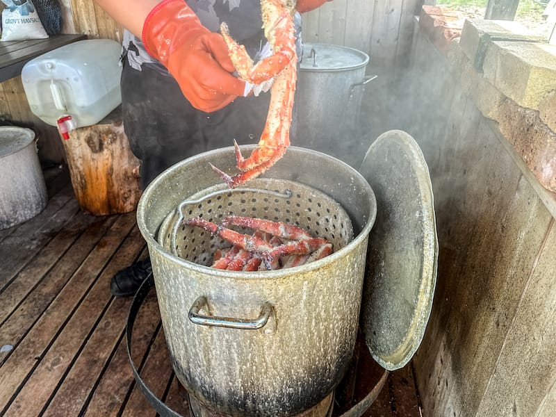 Cleaning the steamed crabs