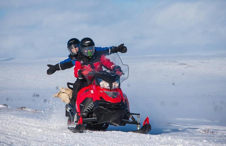 Snowmobiling in Alta