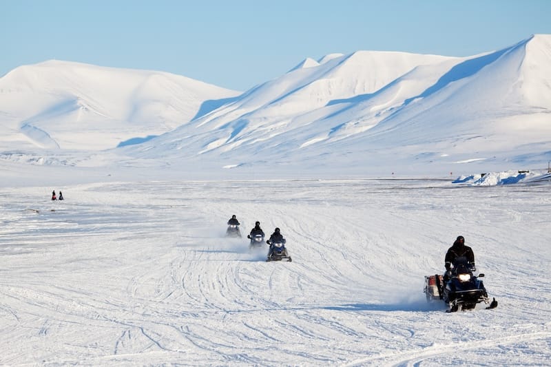 Snowmobiling during March in Svalbard