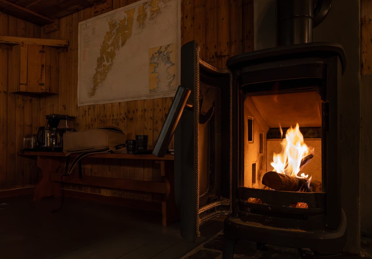 Fireplace inside Sakrisøy Rorbuer