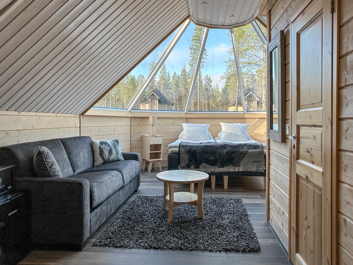 Inside a glass igloo at Northern Lights Village Saariselka