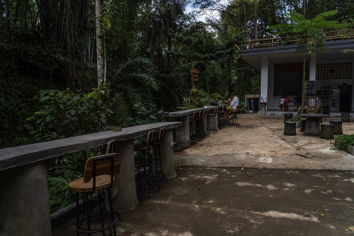 This is an area with seats and a small cafe/warung by the Suwat Waterfall