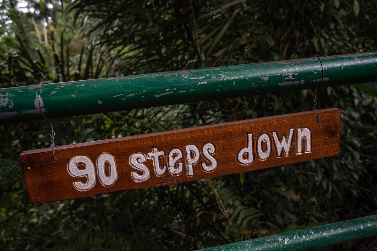 This is a photo that says '90 steps down' which is how many stairs to the waterfall