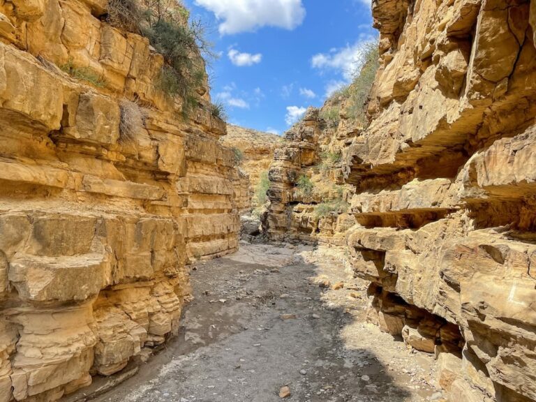 Angels' Canyon in Armenia - how to visit (and more!) This is a photo of the canyon against a blue sky.