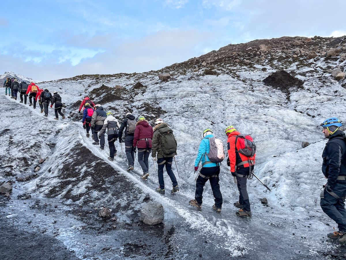 A group of hikers in a line on Skaftafell Glacier in Iceland - this was on a glacier hike there