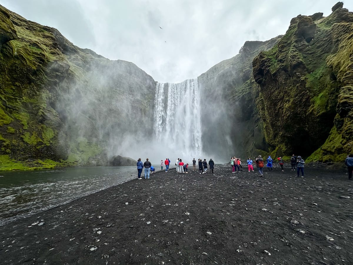 Skógafoss Waterfall - this is a beautiful waterfall that lands into a black sand/rock area. A lot of tourists around