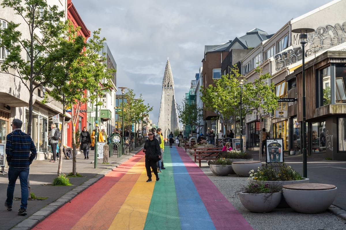 Reykjavík in May
This is a photo of the Rainbow street that leads up to Halgrimskirkja church at the end of it. There are people around and a partially sunny sky
