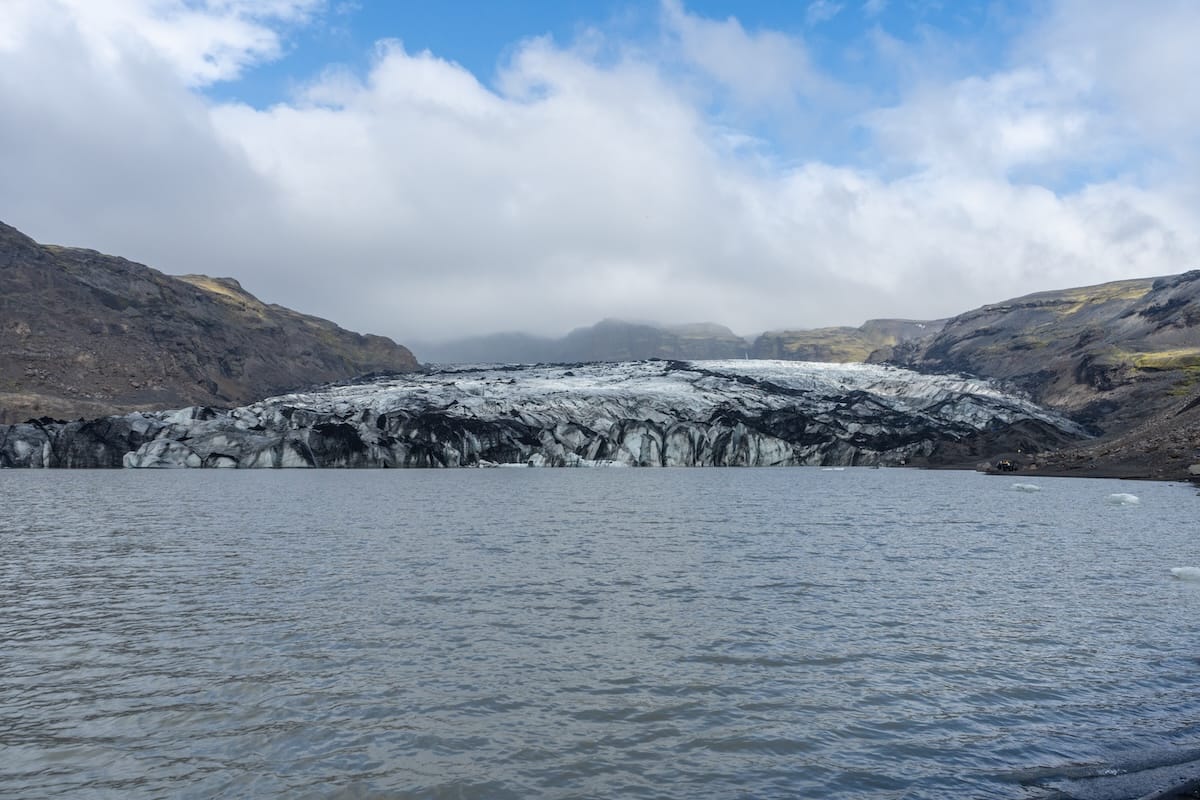 Sólheimajökull Glacier on the south coast of Iceland.
This is a photo of a glacier and a glacier lake lagoon in front of it.