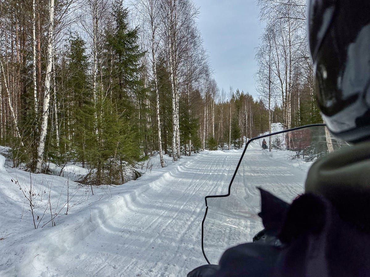 Snowmobiling through Rovaniemi in March
