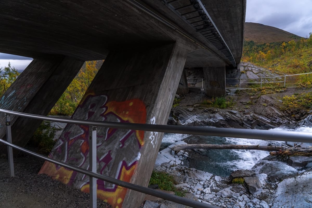 Going under the bridge to the right