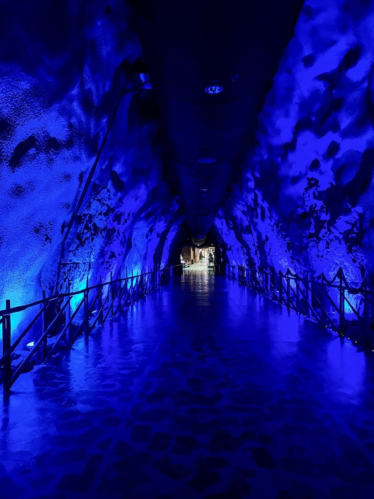 a neon cave that goes into a cave