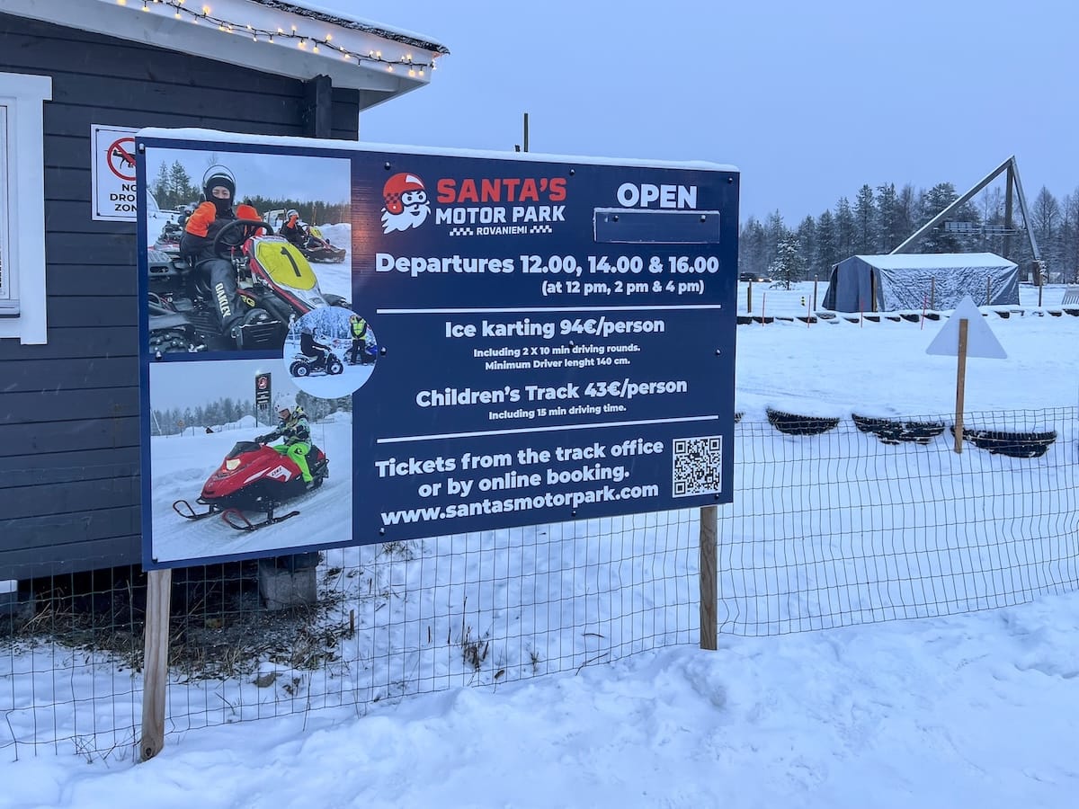 Ice karting in Rovaniemi | Santa's Motor Park
A sign for Santa's Motor Park with time slots, pricing, and a QR code on it.