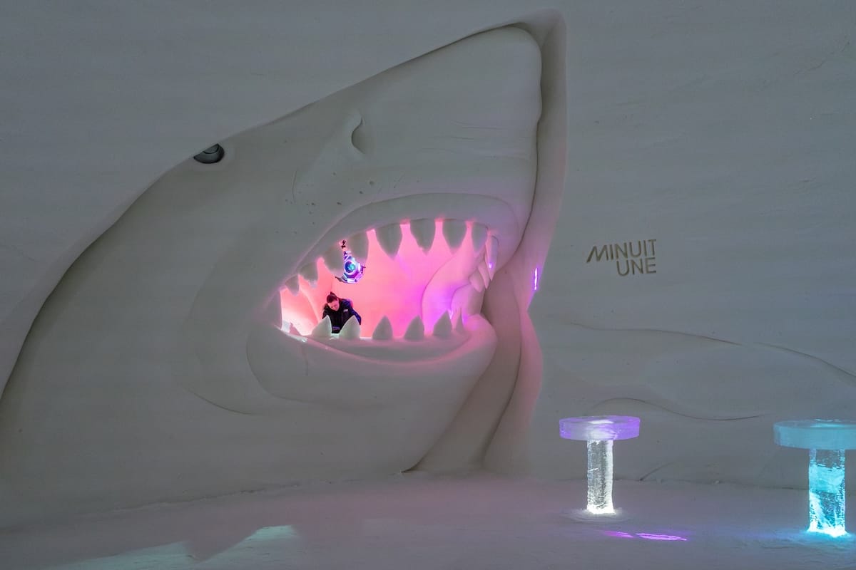 How to visit Lapland Hotels SnowVillage from Levi and Ylläs
Photo: A shark with an ice bar in the opening of its mouth in an ice hotel.