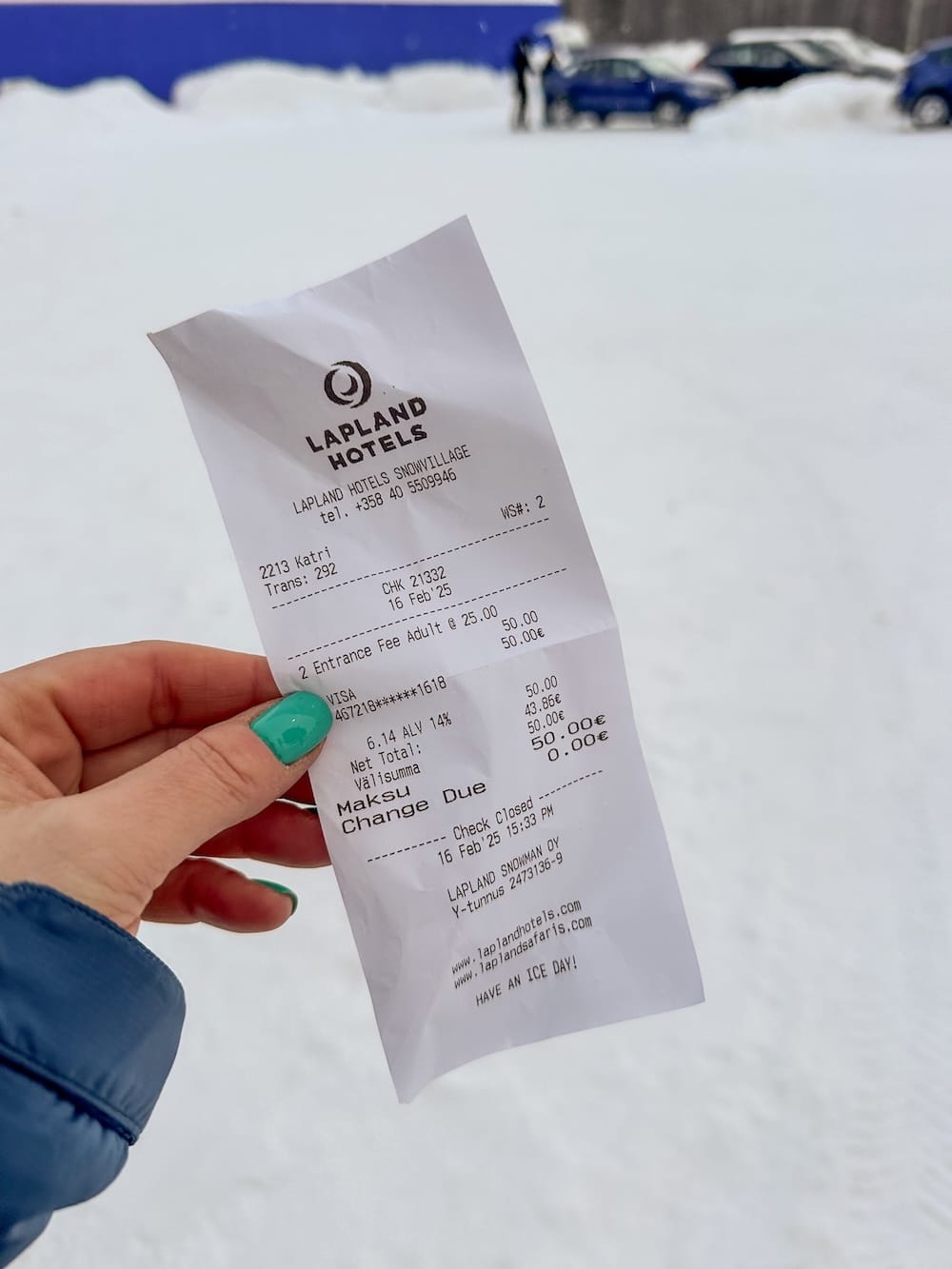 How to visit Lapland Hotels SnowVillage from Levi and Ylläs
Photo: A women holding a receipt for the Lapland Hotels SnowVillage.